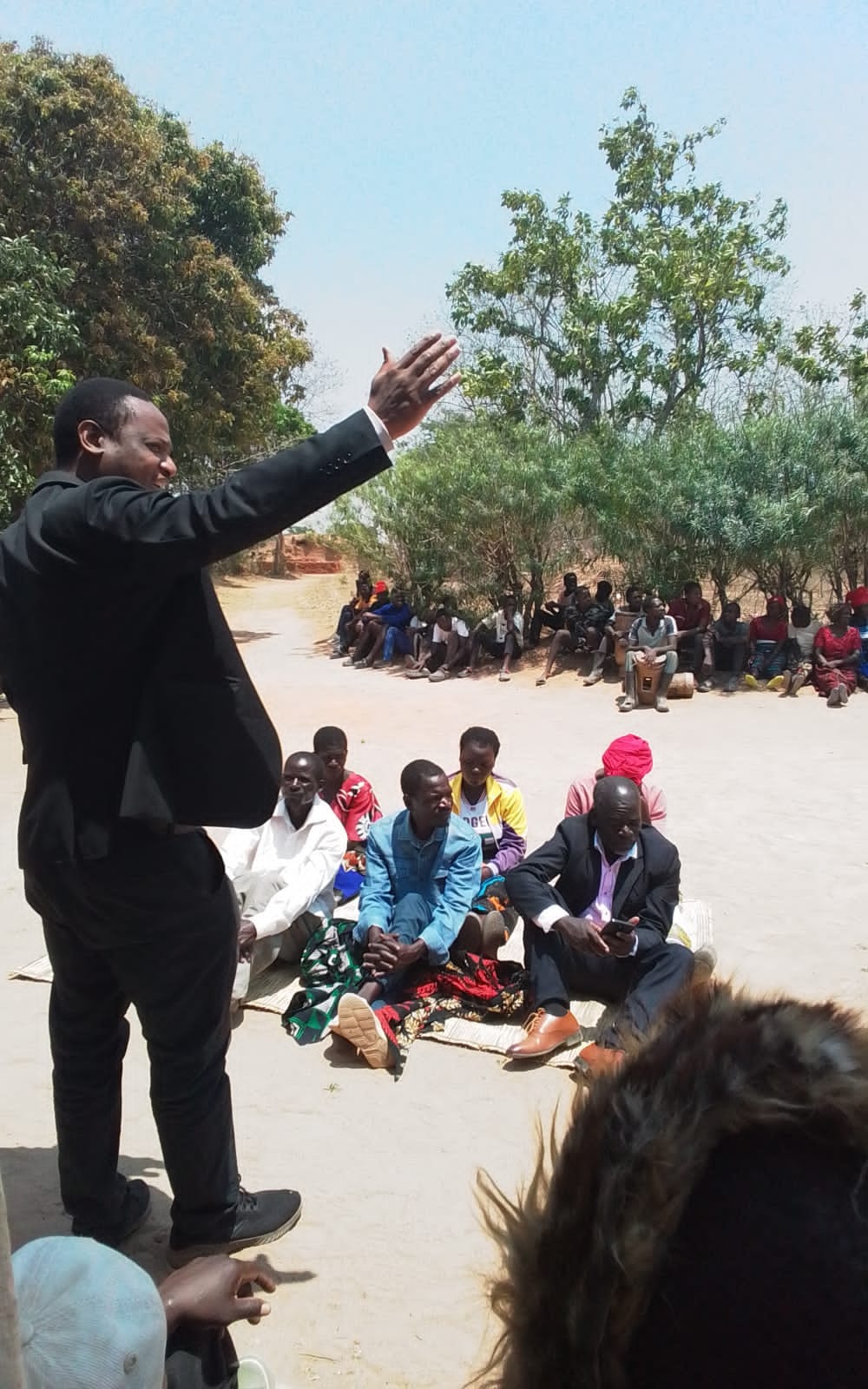 Community leader speaking at a gathering
